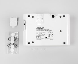 Оборотная сторона и сменные воздушные фильтры компрессорного небулайзера Omron C 24